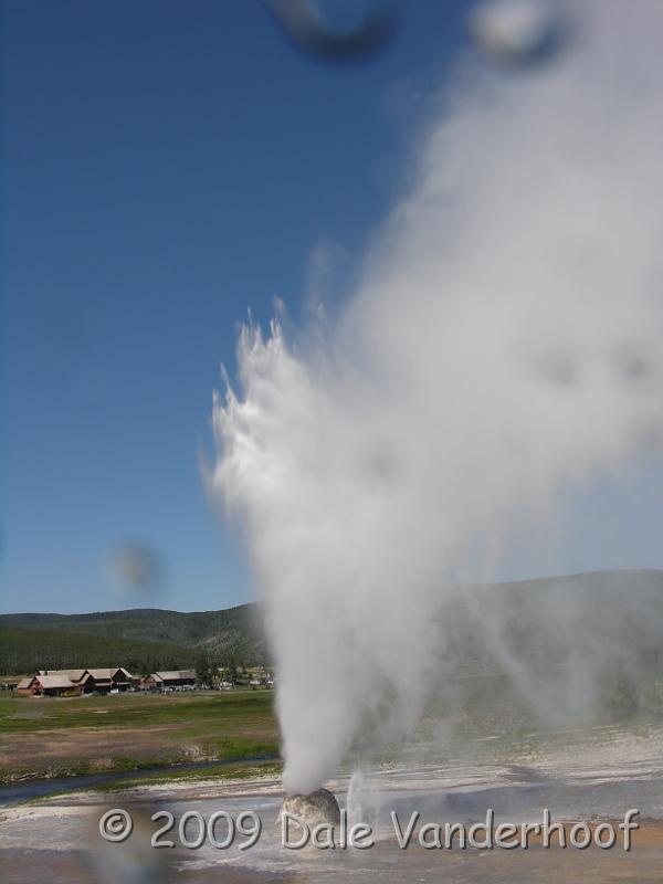 DSCN0206.JPG - The Beehive guyser. Unlike Old Faithful guyser, which shoots hot water, this one shoots COLD water. I know first hand, because, if you look closely, you can see water drops on the lens. It erupted about 160 feet in the air and we were downwind. The Beehive is not always active, and we were fortunate to see it erupt.